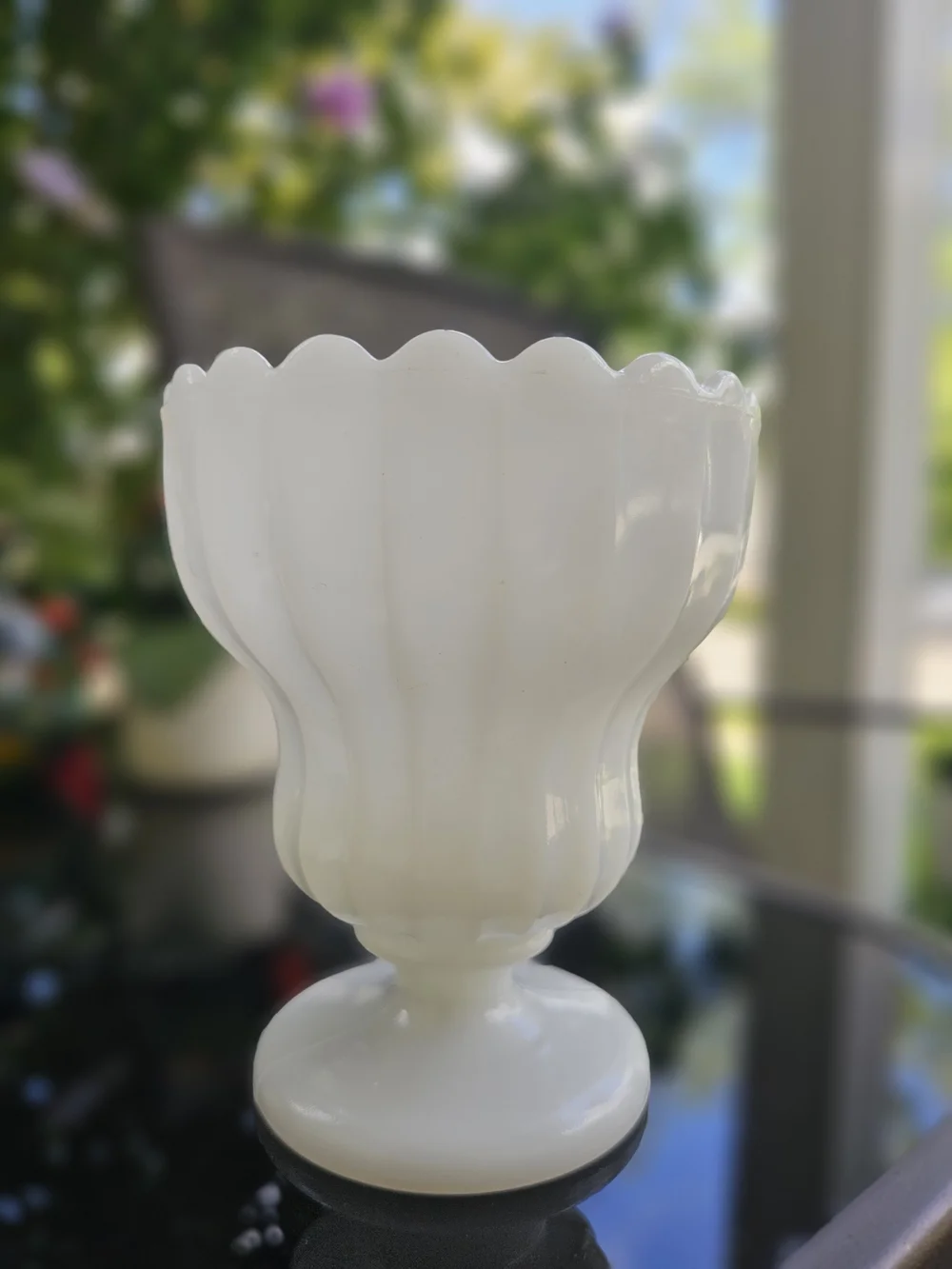 Vintage E.O. Brody white milk glass footed urn planter featuring a fluted body